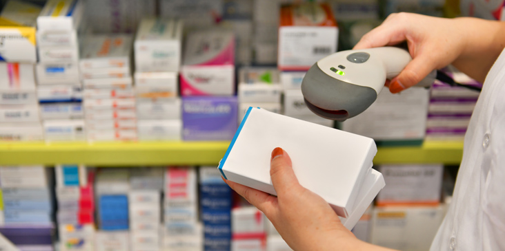 Pharmacist using Inventory scanner 